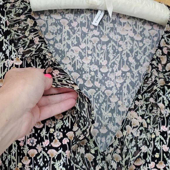 Adorable BCBG knit romper. So comfortable.Delicate pattern. Sheer ruffle… - Picture 1 of 6
